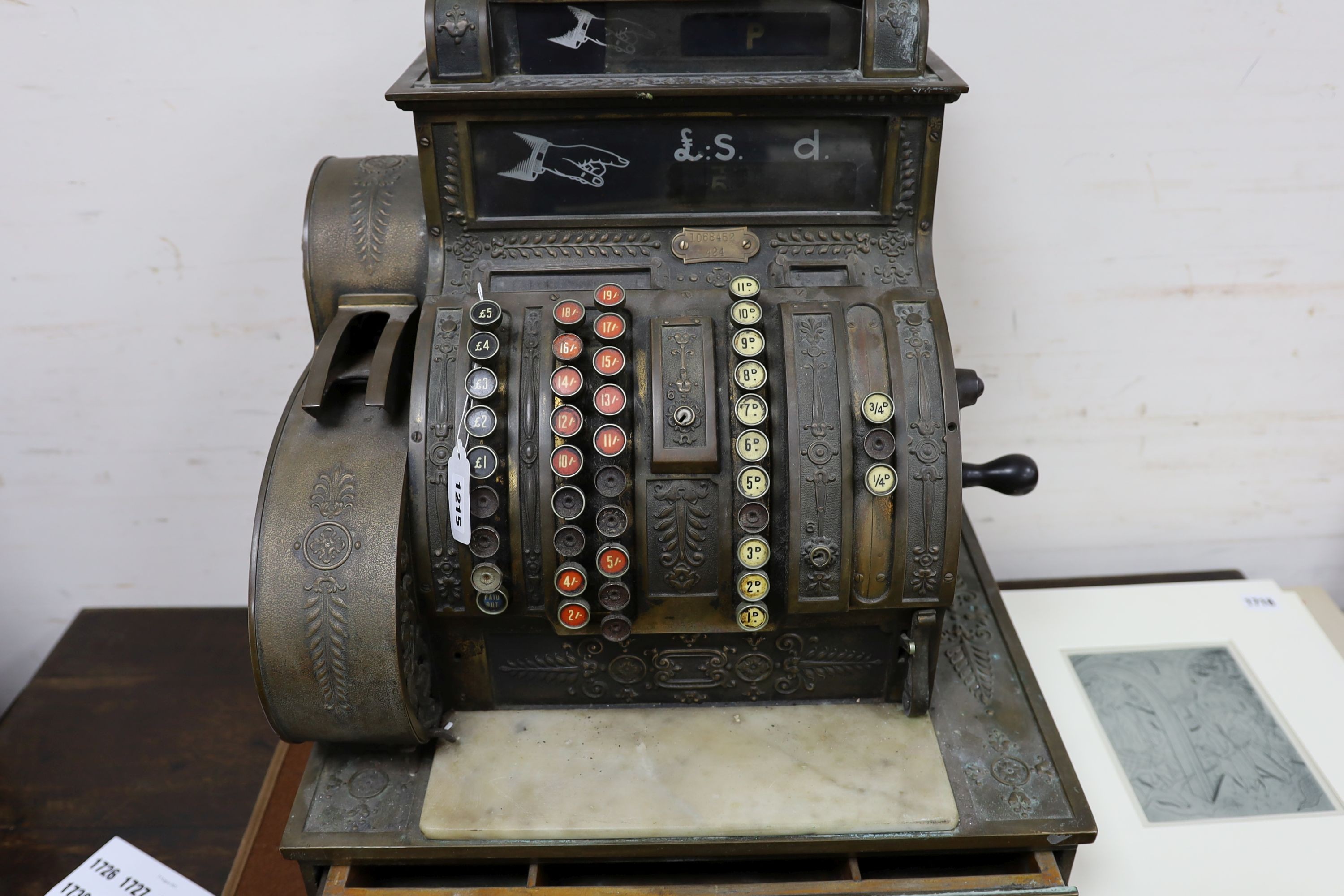 An early 20th century American National cash register, Serial Number 1068452/484, width 47cm, depth 39cm, height 57cm